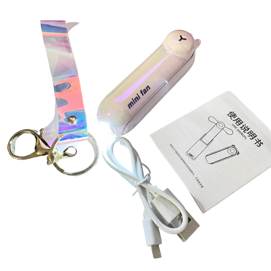 Portable mini fan with colorful strap, USB cable, and user manual on a white background